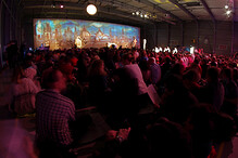 Prayers in exhibition hall at Letnany